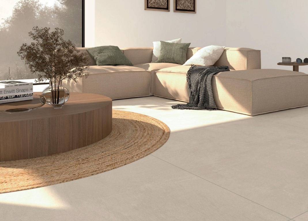 Wohnzimmer mit beige Fliese in Betonoptik Interbau Empire