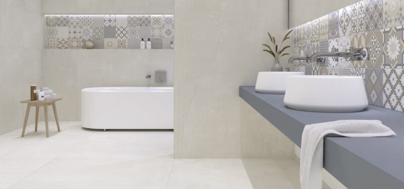 Bedezimmer mit grauer Fliese in Betonoptik Interbau Empire